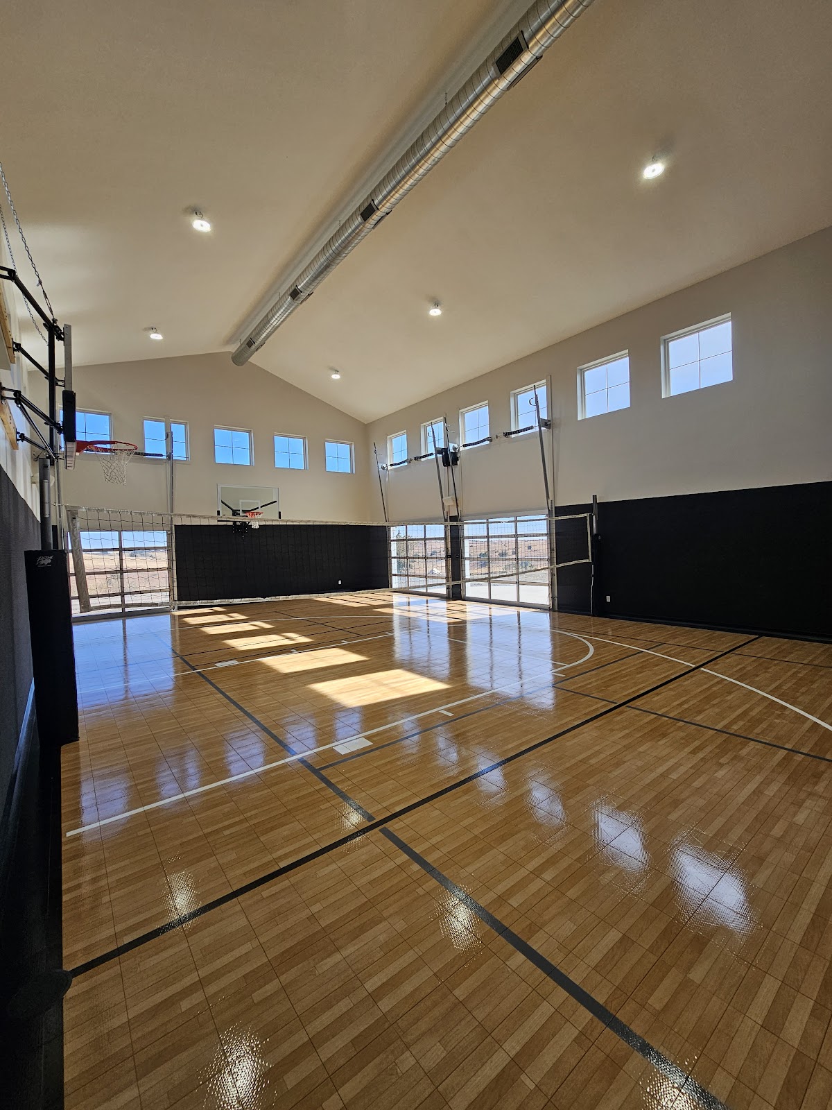 Indoor basketball court with freshly painted walls