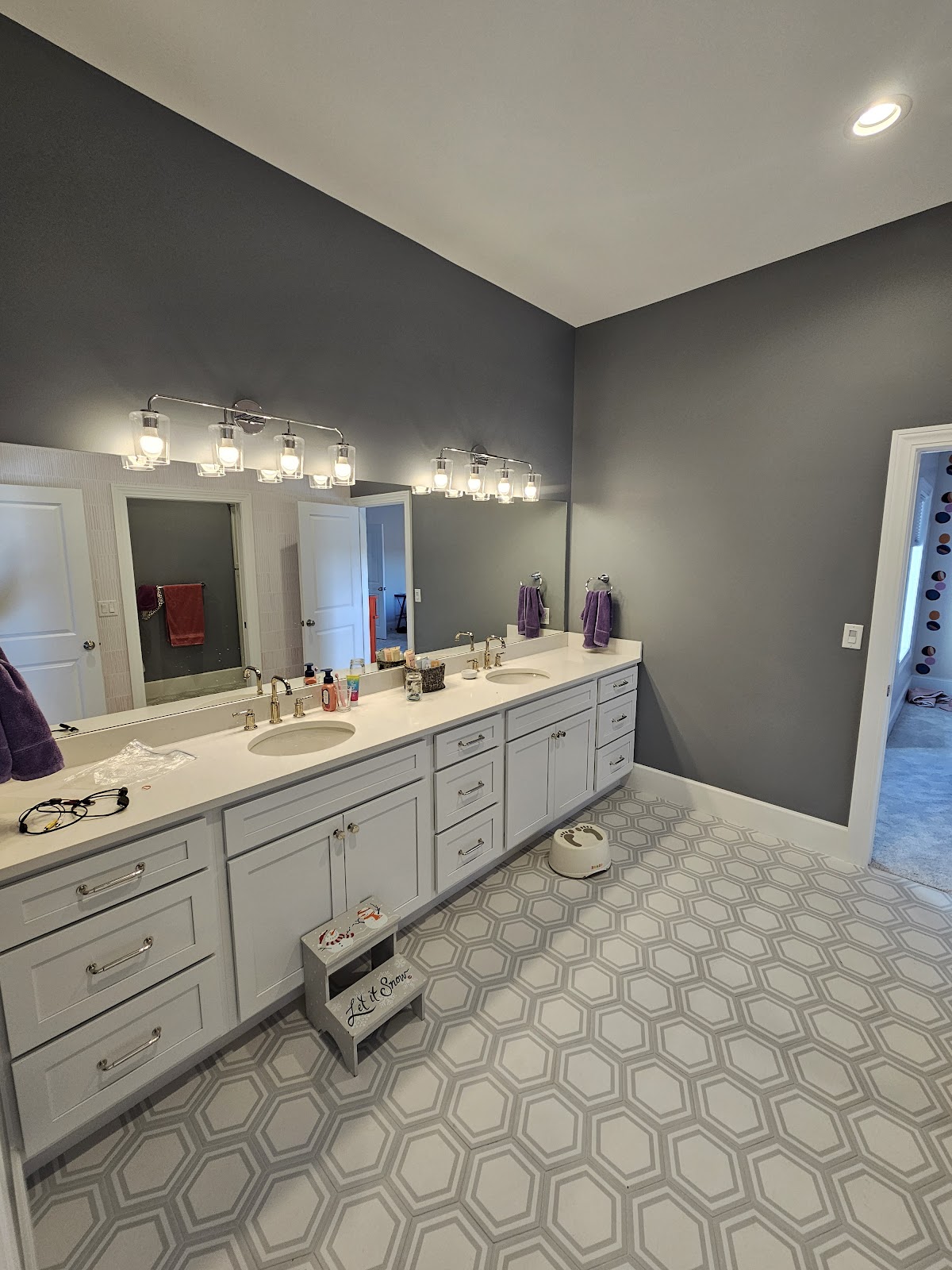 Bathroom double vanity with charcoal accent wall